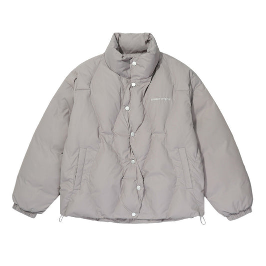Gray puffer jacket on a white background
Closure Type: Snap Button Closure
Button Style: Hidden Press-Stud Snap Fasteners
Collar Type: Stand Collar / Mock Neck
Style: Minimalist Streetwear
Outerwear Type: Puffer Jacket
Fit Type: Relaxed / Loose Fit
