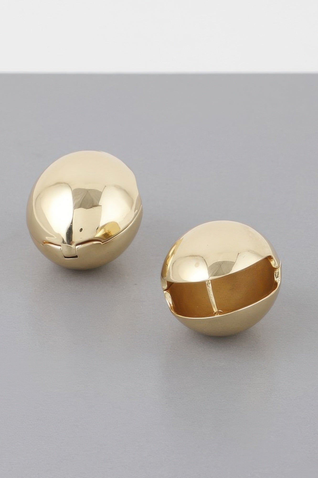 TRIBECA Empty Shell Clasp Earrings: NYFW BYMANYC ® New York-1