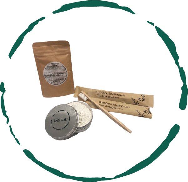 Set of bamboo toothbrushes, dental floss, and a container with a brand logo on a white background.