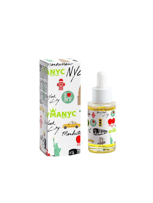 Bottle and box of New York City-themed product on a white background