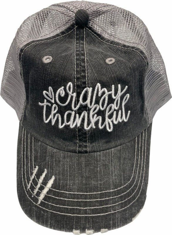 Black distressed mesh trucker hat with white "Crazy Thankful" embroidered lettering, curved brim, contrast stitching, and breathable mesh back, shown on a white background. Vintage Distressed "Crazy Thankful" Embroidered Trucker Hat – Adjustable Unisex Mesh Baseball Cap for Thanksgiving, Fall & Everyday Wear