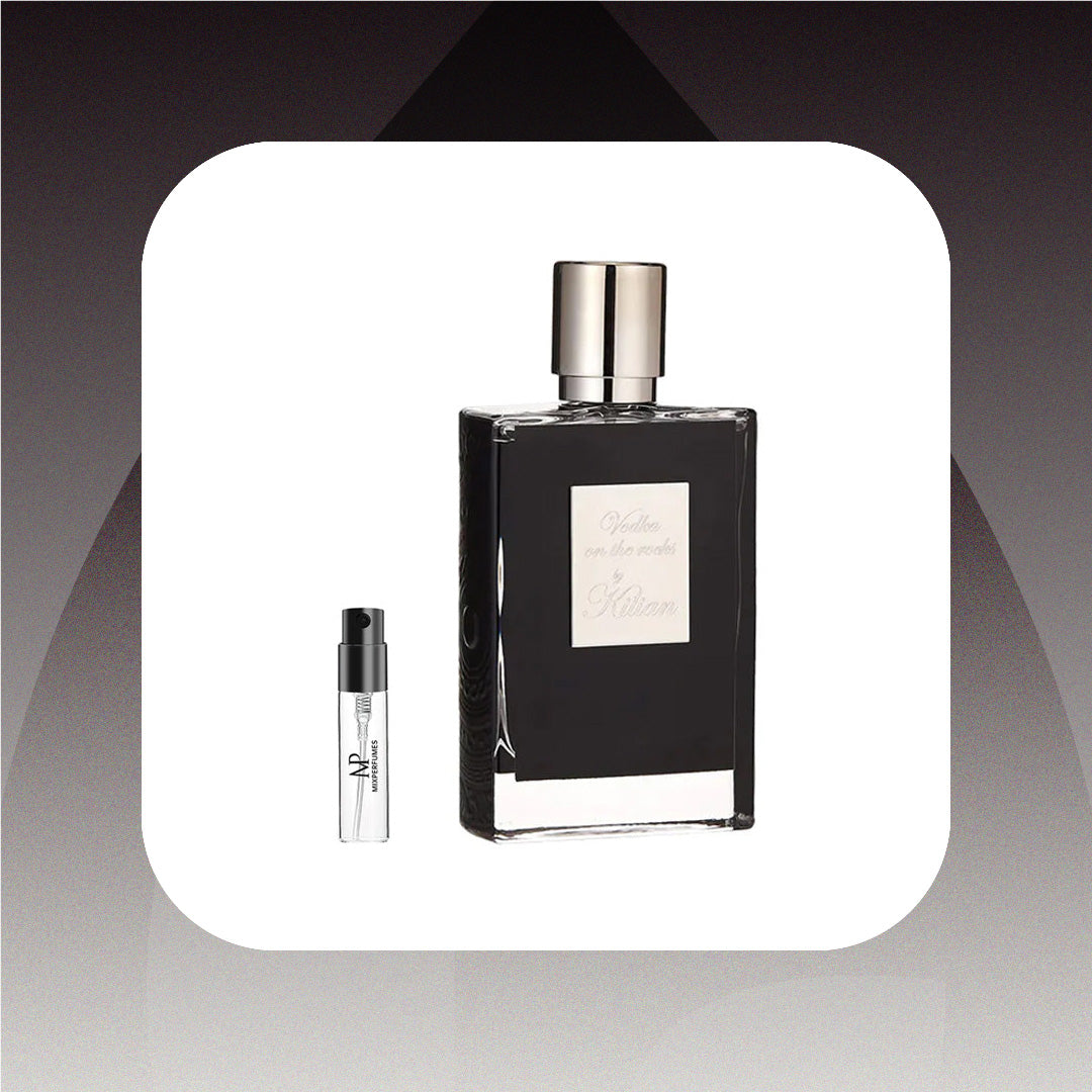 Black perfume bottle with silver cap and smaller white bottle on a gradient background