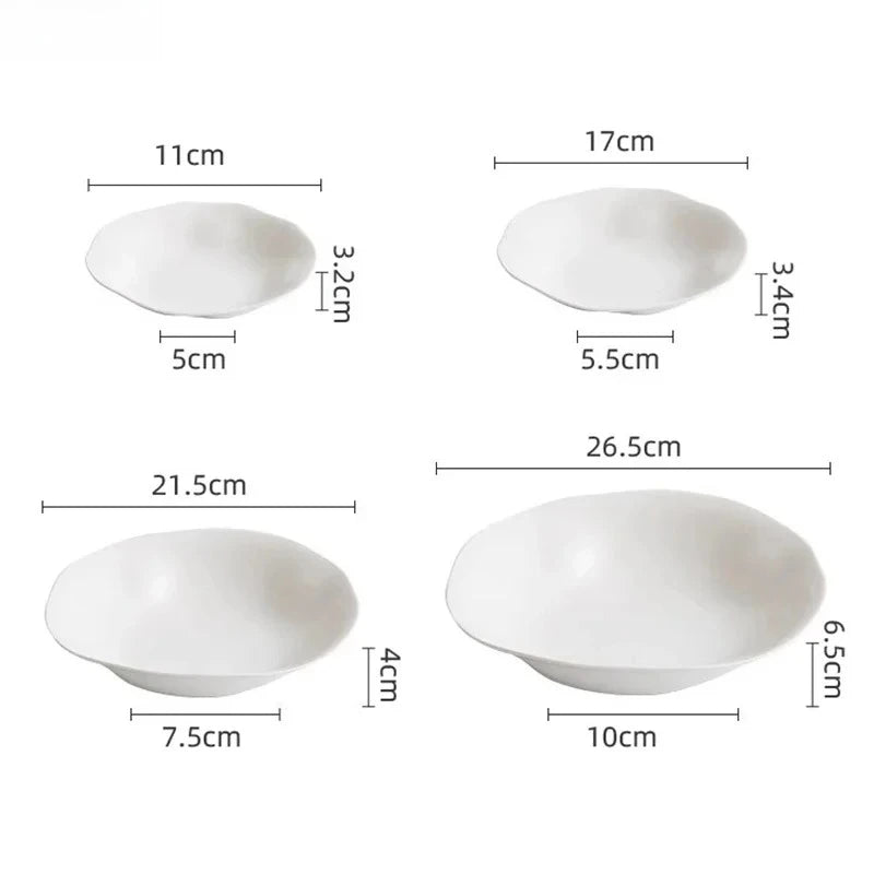 White ceramic bowls with measurements on a white background