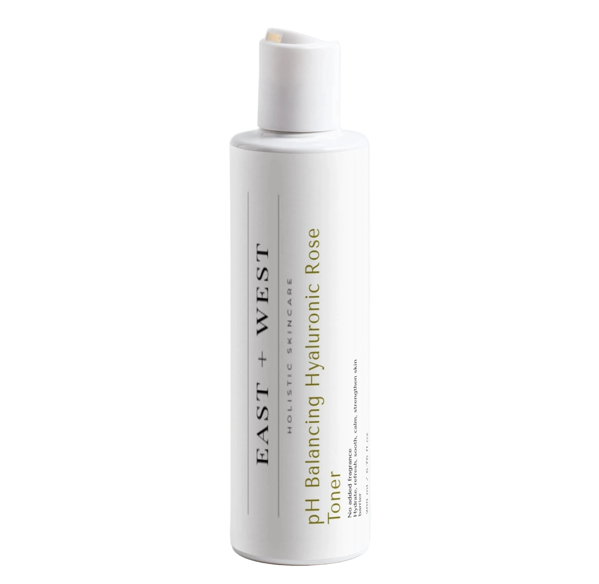 White bottle of East + West pH Balancing Hyaluronic Rose Toner on a white background