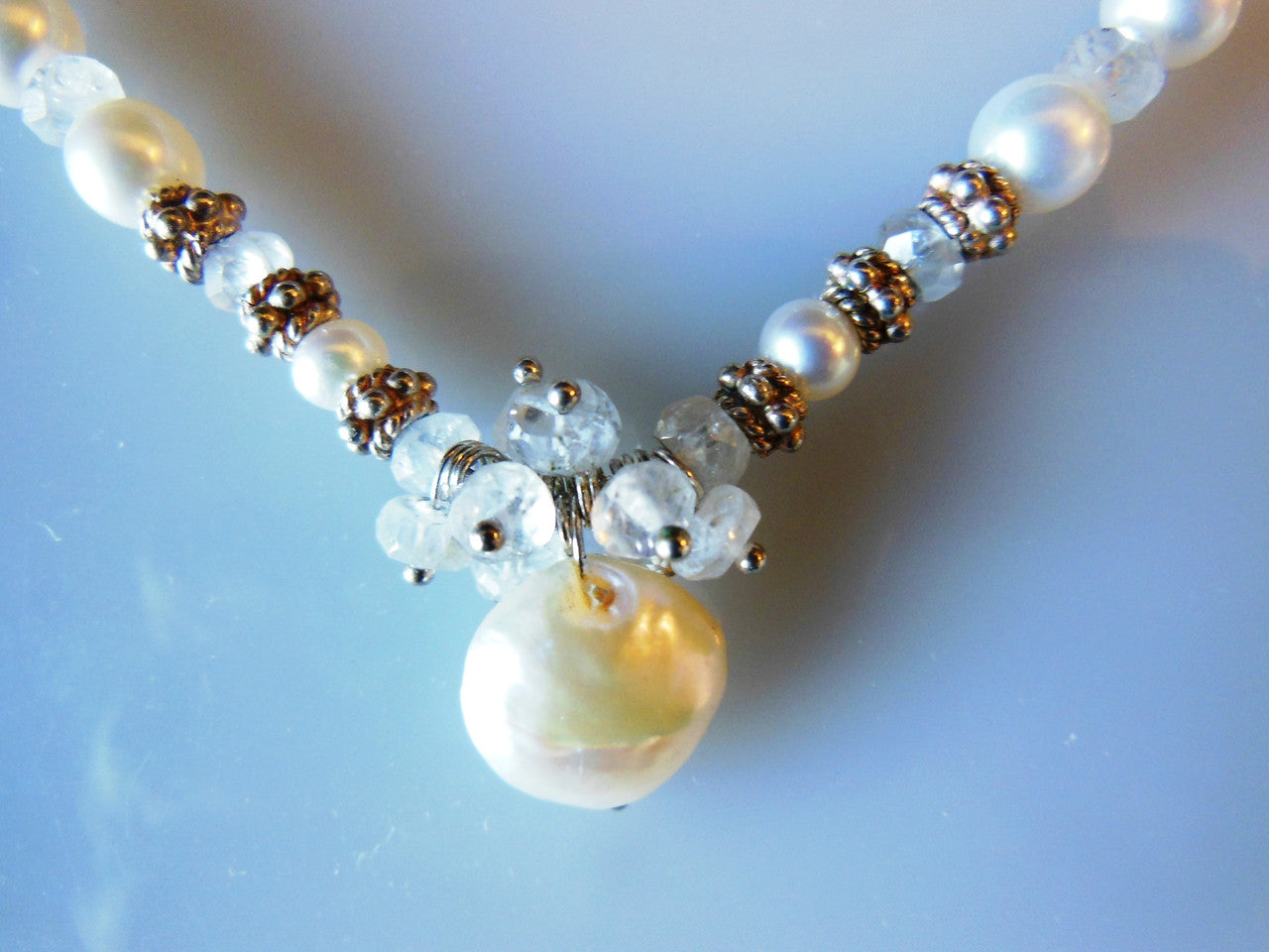 Coin pearl and moonstone snowflake cluster on round pearl necklace-1