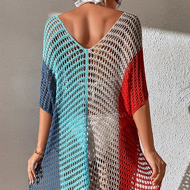 Color-blocked crochet cover-up with blue, beige, and red sections on a neutral background. beach cover up, cover up dress, shirt dress, resort wear, vacation, beachwear, swim cover up, bikini cover up, poolside, cruise, tropical, summer, sleeveless, pink, red, women, travel, resort, coastal, LUXEBYMIMI