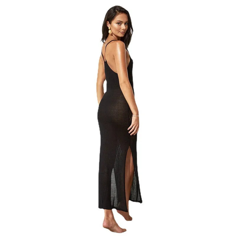 Woman wearing a black sheer dress on a white background beach cover up, maxi beach dress, swimsuit cover up, beach sundress, maxi sundress, women's beachwear, resort wear, vacation dress, beach dress, poolside cover up, sleeveless dress, scoop neck dress, high waist dress, summer dress, tropical vacation outfit, cruise wear, beach vacation dress, resort dress, swim cover up, lightweight dress, vacation clothing, coastal style dress, boho beach dress, women's resort wear, flowy maxi dress, beach fashion