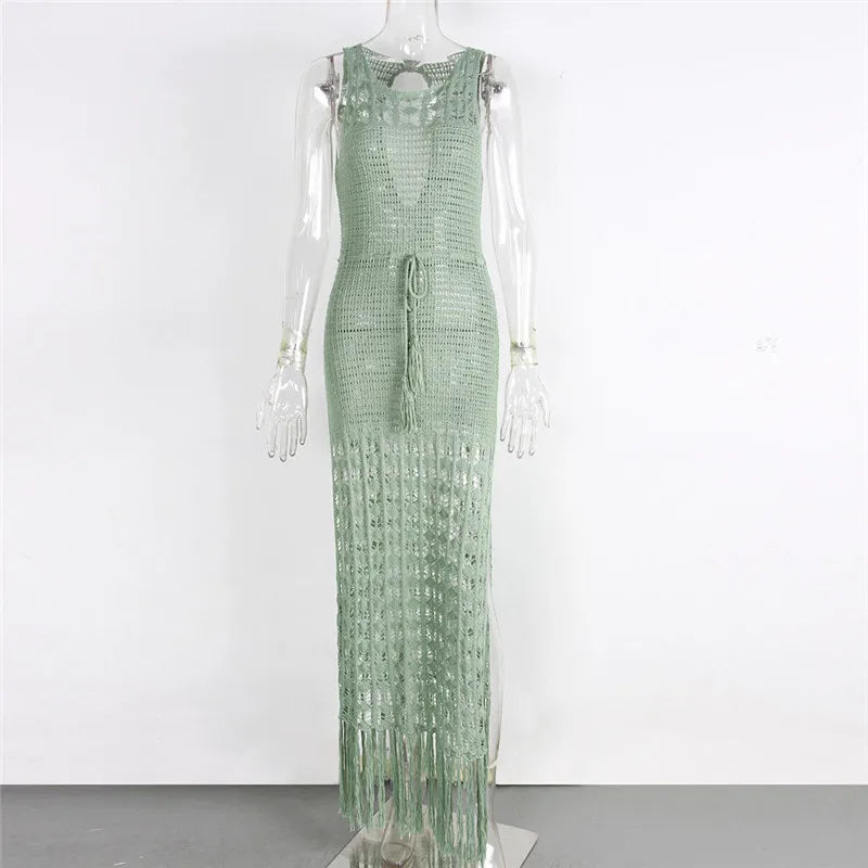 Green beaded dress on a mannequin against a white background beach cover up, crochet, crochet dress, resort wear, vacation, beachwear, swim cover up, bikini cover up, sleeveless, maxi dress, boho, knit, tassel, poolside, cruise, tropical, summer, women, resort, coastal, LUXEBYMIMI