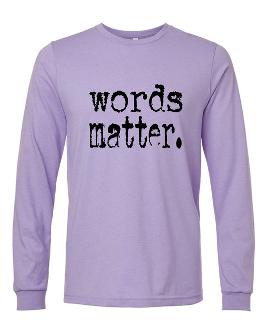Purple long-sleeve shirt with 'words matter.' text on a white background