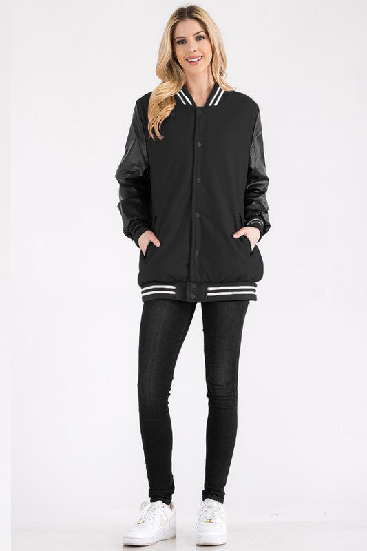 Women's Boyfriend Oversize Letterman Jacket
Varsity Jacket Style
Snap Button Closure
PU Sleeve
Padded and Quilted Inside
Inside Left Chest Pocket

100% Polyester