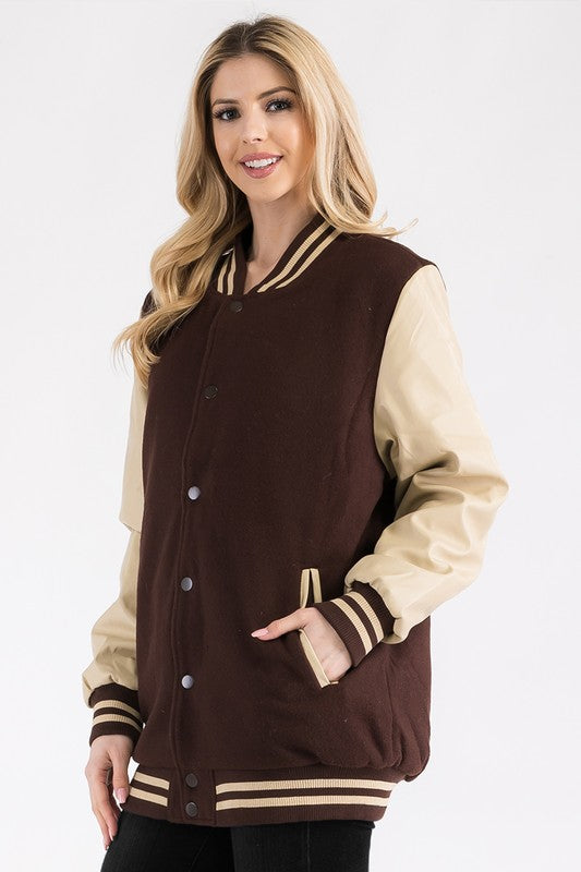 Women's Boyfriend Oversize Letterman Jacket
Varsity Jacket Style
Snap Button Closure
PU Sleeve
Padded and Quilted Inside
Inside Left Chest Pocket

100% Polyester