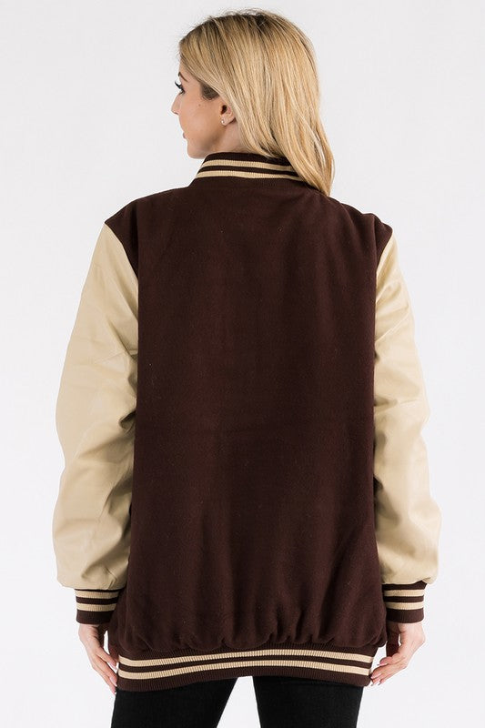 Women's Boyfriend Oversize Letterman Jacket
Varsity Jacket Style
Snap Button Closure
PU Sleeve
Padded and Quilted Inside
Inside Left Chest Pocket

100% Polyester