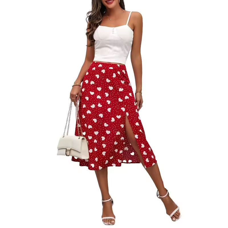 Twirl into elegance with this charming polka dot heart-shaped wrap skirt! Crafted from a comfortable polyester and spandex blend, this mid-length swing skirt features a flattering slit design and playful color-block styling perfect for everyday sophistication. The printed hearts and polka dots add a whimsical touch to your wardrobe, while the wrap silhouette creates a graceful, feminine drape. Available in sizes S M L XL, this versatile piece transitions effortlessly from office to weekend adventures. 