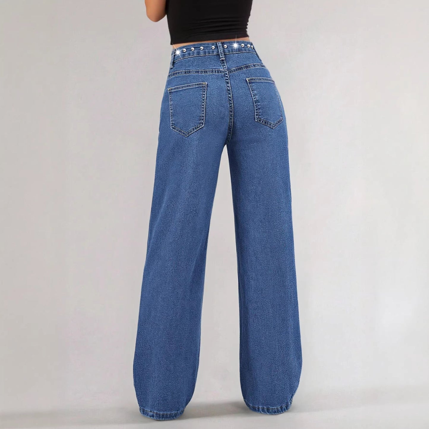 Blue jeans on a plain background