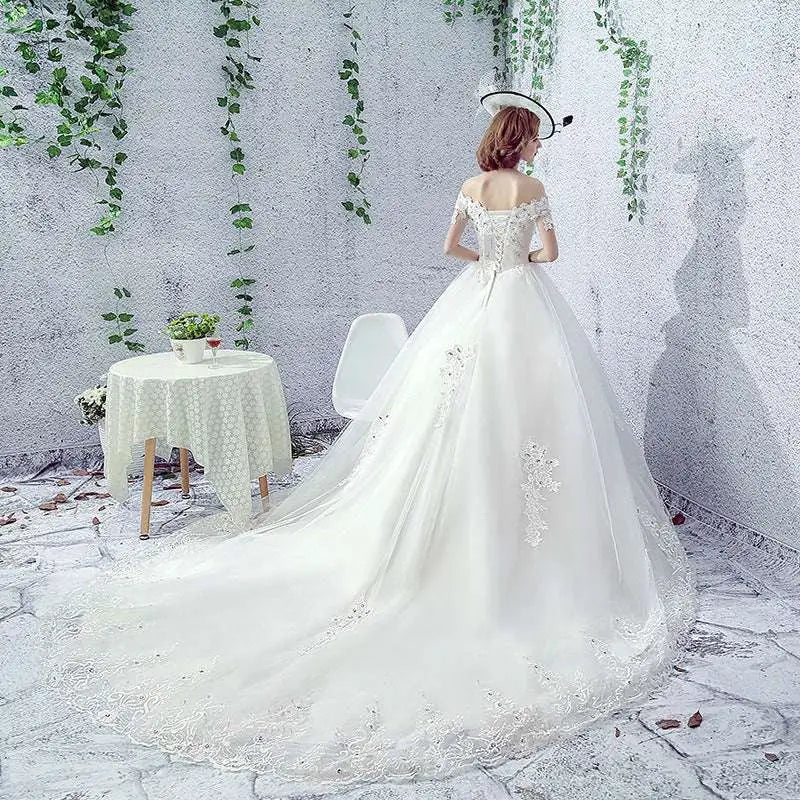 Elegant Lace Off-the-Shoulder Wedding Dress Bride