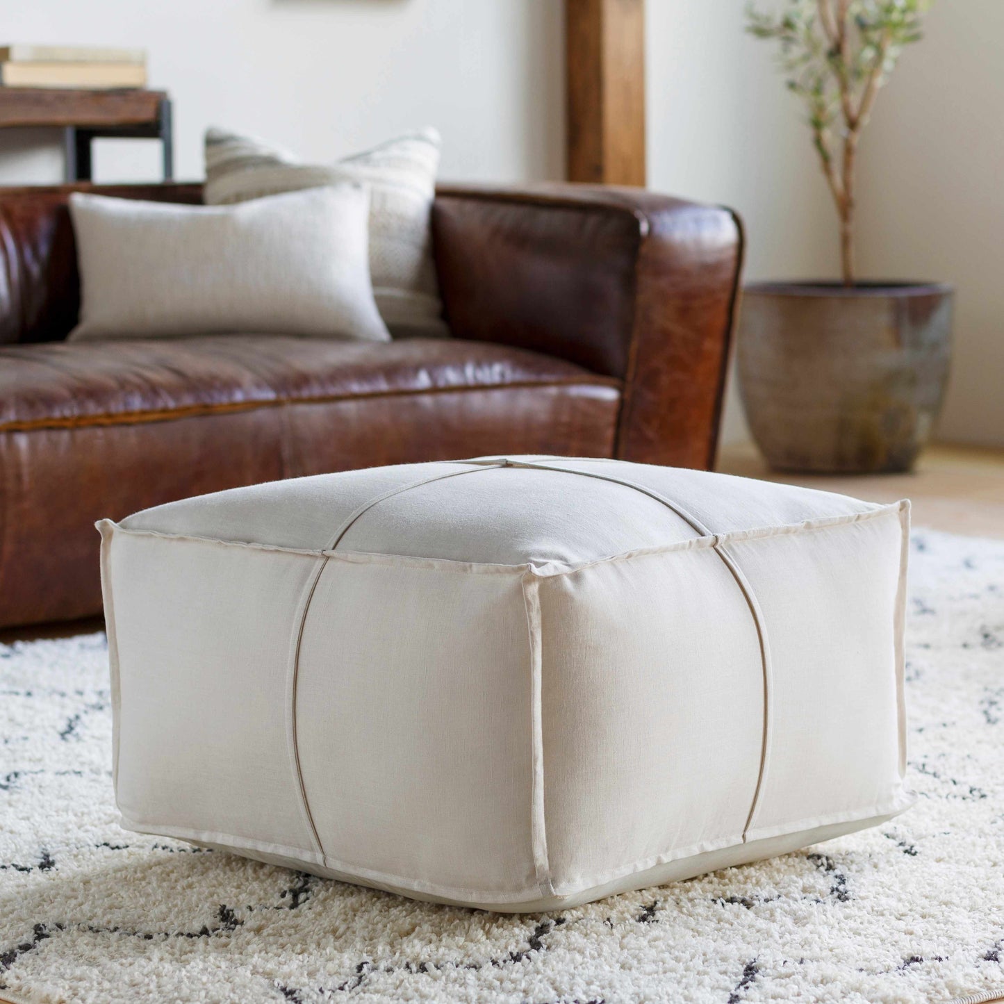 Friendsville Solid & Striped Ivory Pouf-0