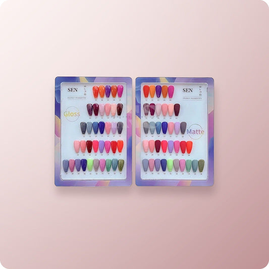 Two SEN brand press-on nail kits displayed side-by-side on a soft pink background, featuring one glossy and one matte set, both containing multiple rows of assorted artificial nail shades.