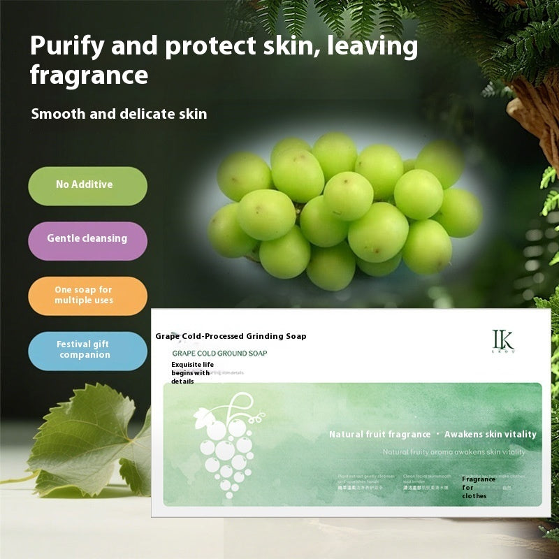 Soap bar with grape design and text about skin care benefits, set against a natural background.