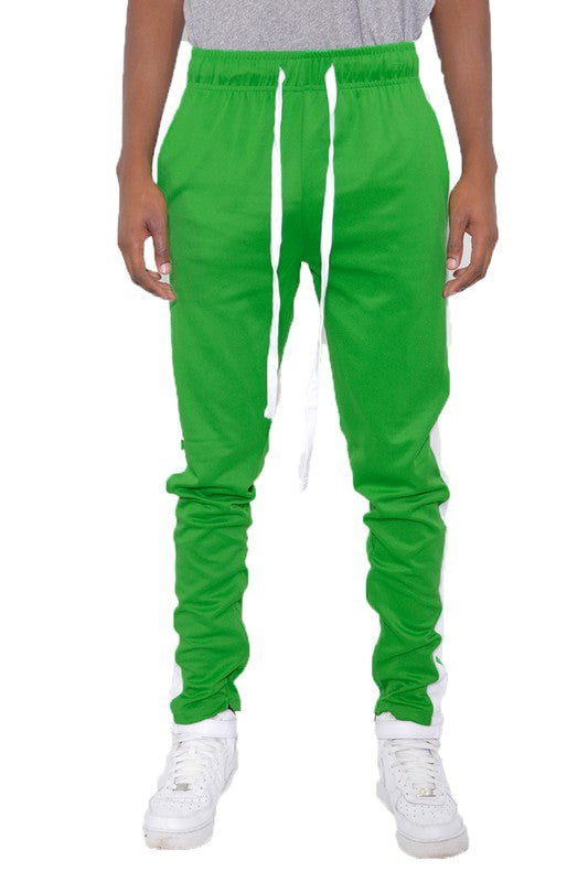 Single Stripe Track Pant
Ankle Zipper
Elastic Waist with Drawstring
Standard Pocket with Single Back Pocket
Regular Slim Fit
95 Polyester 5 Spandex

Model is 5'11 wearing a size Medium.


Made In: Imported GREEN PANTS
