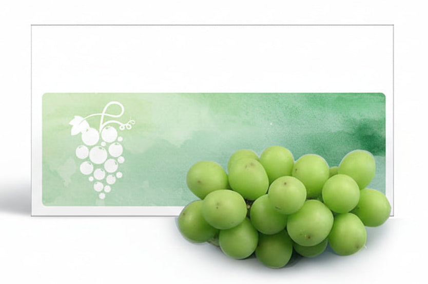 Grape cold ground soap packaging with a bunch of green grapes on a white background