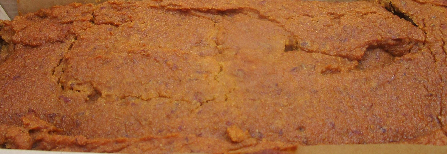 Baked good in a rectangular pan with a white interior