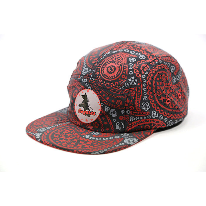 A red and black paisley bandana cap with a circular 'Biker Style' patch on the front, photographed on a clean white background.