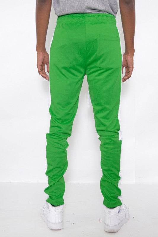 Single Stripe Track Pant
Ankle Zipper
Elastic Waist with Drawstring
Standard Pocket with Single Back Pocket
Regular Slim Fit
95 Polyester 5 Spandex

Model is 5'11 wearing a size Medium.


Made In: Imported GREEN PANTS