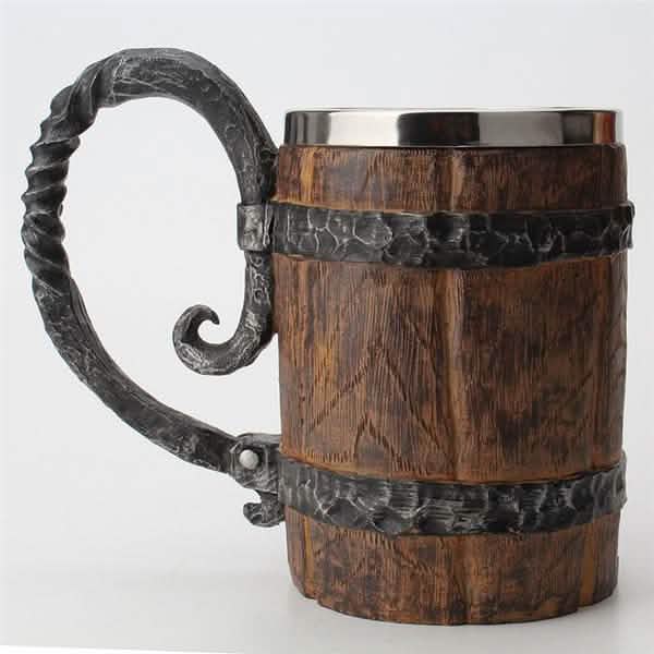 Wooden mug with metal handle and banding on a white background