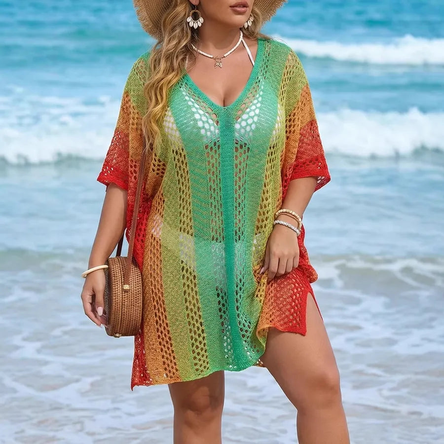 Woman wearing a colorful beach cover-up with ocean in the background