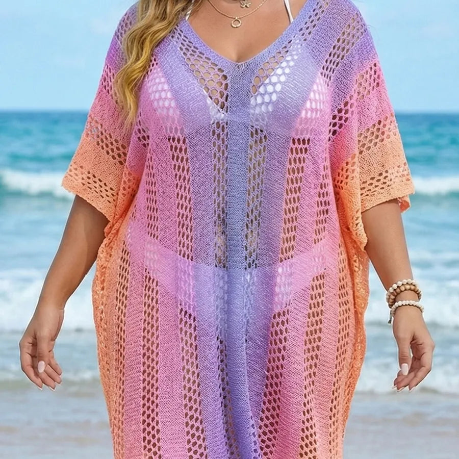 Woman wearing a colorful crochet cover-up on a beach