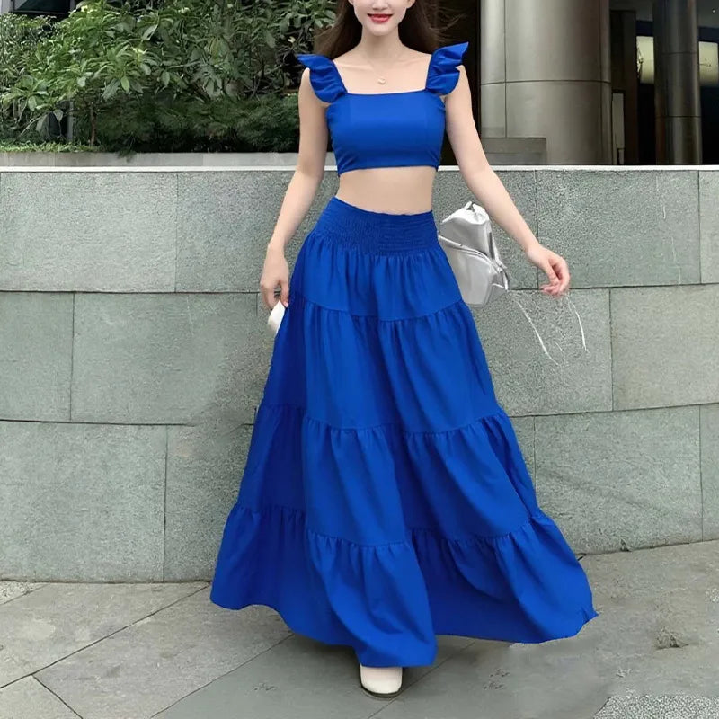 Royal blue women's two piece skirt set with ruffle shoulder crop top, square neck, sleeveless blouse, high waist tiered maxi skirt, elegant summer vacation outfit, casual beach resort matching set, stylish fashion co-ord set for women