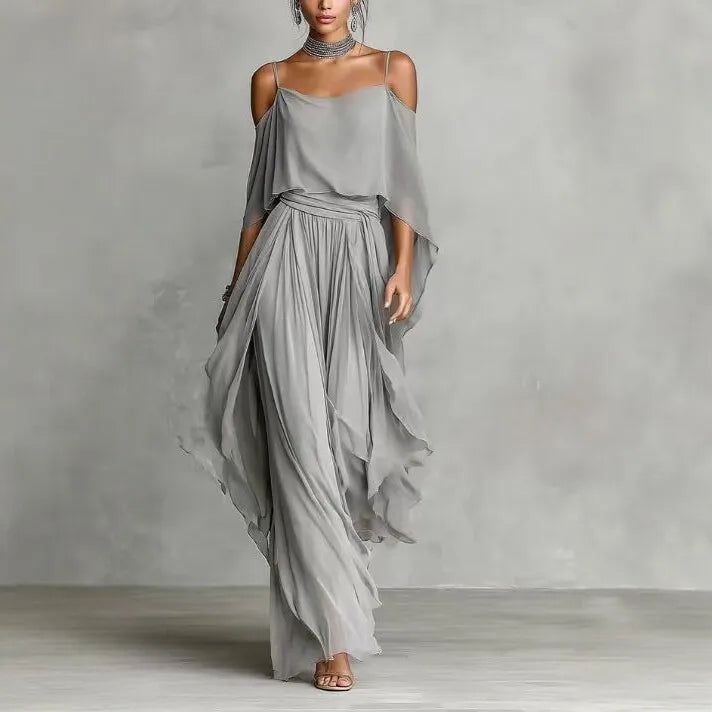 Luxury women's gray chiffon two-piece wide leg pants co-ord set with asymmetrical cold shoulder camisole top, elegant resort wear outfit for beach vacations, parties, weddings and special occasions.