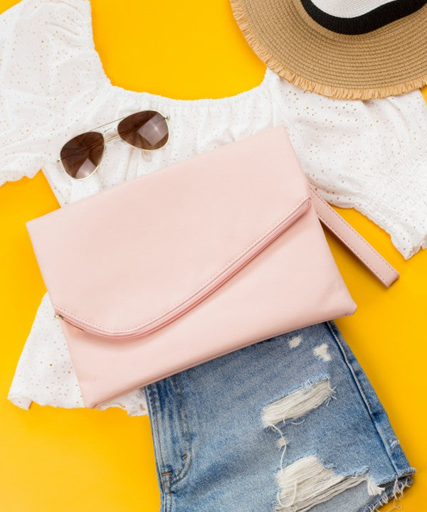 pink foldover clutch bag Simple, sleek, and ready for whatever comes next. This oversized foldover envelope clutch is crafted from soft vegan PU 