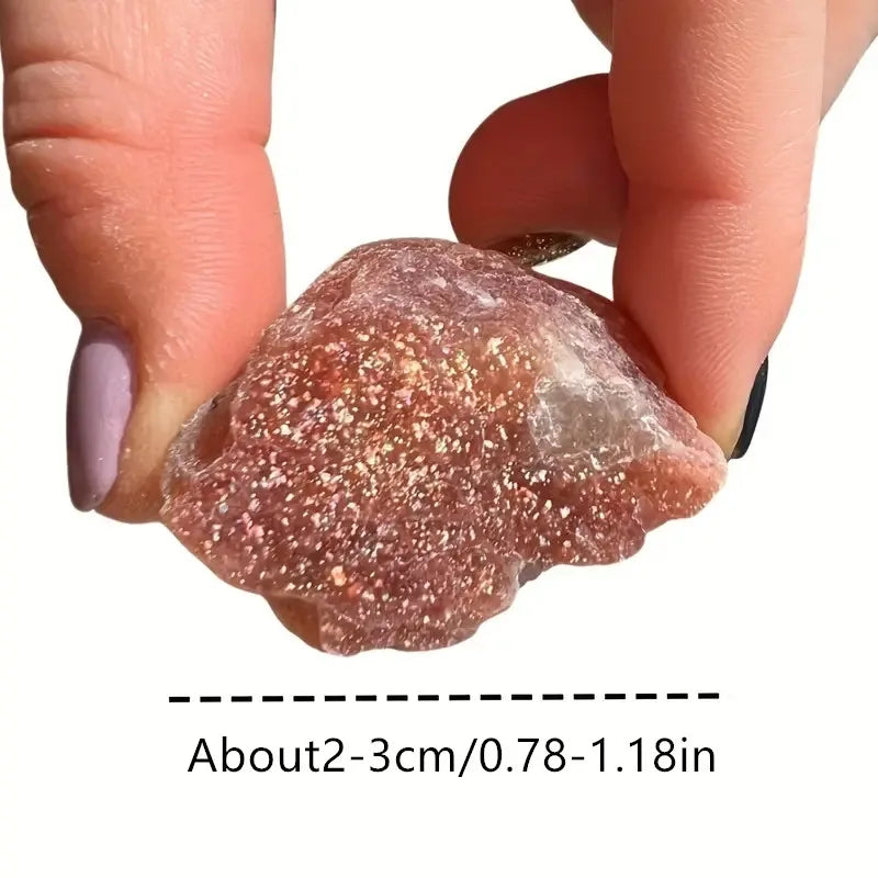 Hand holding a rough crystal rock Natural Rough Sunstone Crystal Stones – 5pcs / 10pcs High Quality Raw Crystals for Tumbling, Cabbing, Polishing, Wire Wrapping, Wicca &amp; Reiki

Bring the warmth of the sun into your space with these shimmering natural rough Sunstone crystals. Each raw piece glows with golden, peach and coppery flashes, making it perfect for spiritual work, crystal crafting, or simply adding a radiant touch to your altar or home décor. 