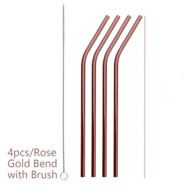 Set of four rose gold bend straws with a brush on a white background
