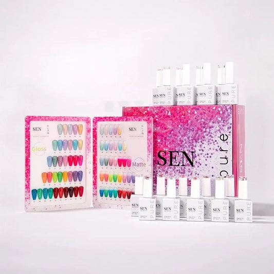 SEN nail polish set with multiple small white bottles and two color sample cards, including a large glittery pink box, arranged on a clean white background.