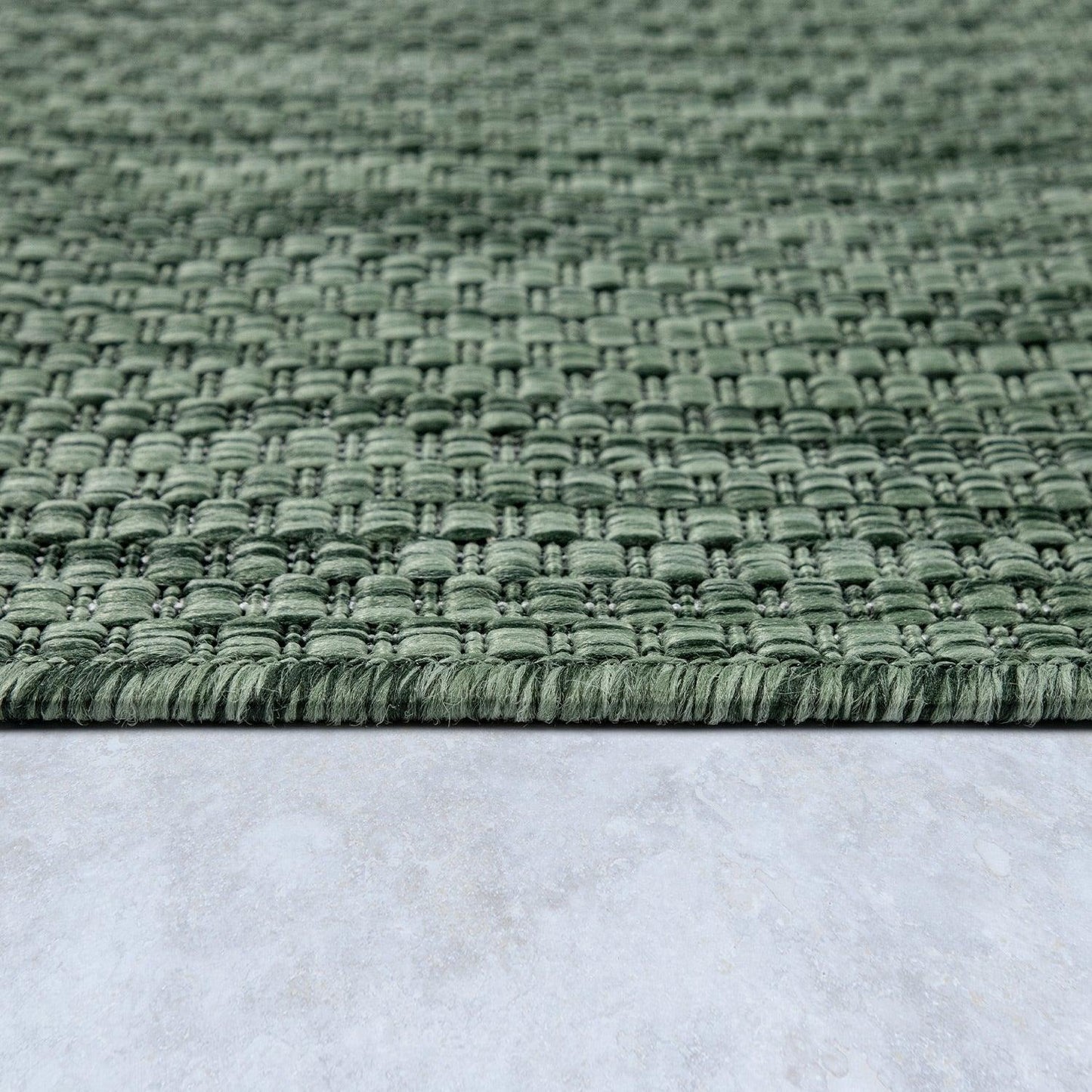 Solid Outdoor Rug for Patio or Balcony weatherproof in Mottled Dark Green-1