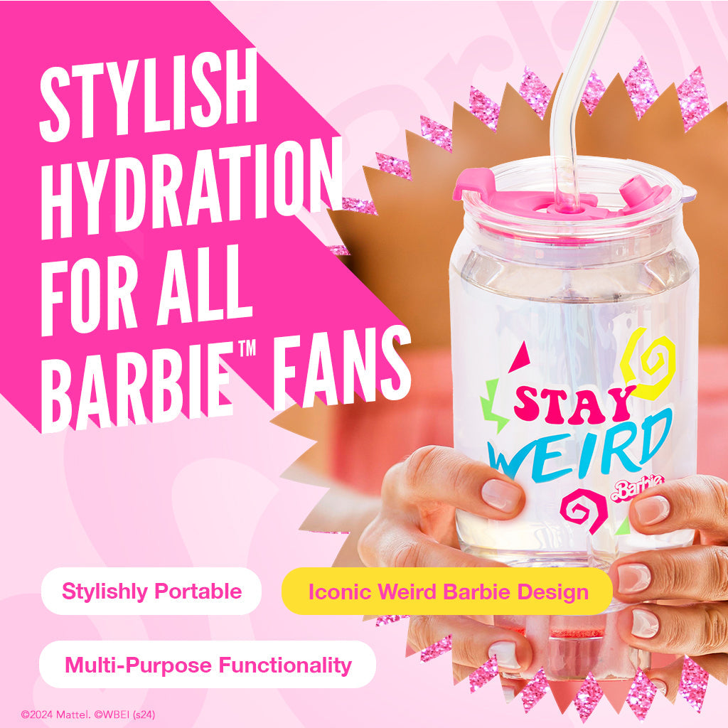 Glass Tumbler with Stay Weird Babrie text on it - with pink lid and straw, held by a hand, against a pink background with text about Barbie fans.
